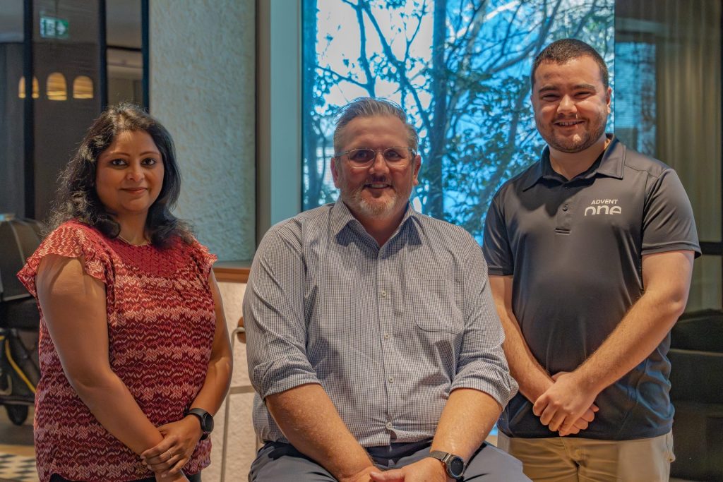 Matt Batten, General Manager, Managed Services at Advent One (centre) with two team members