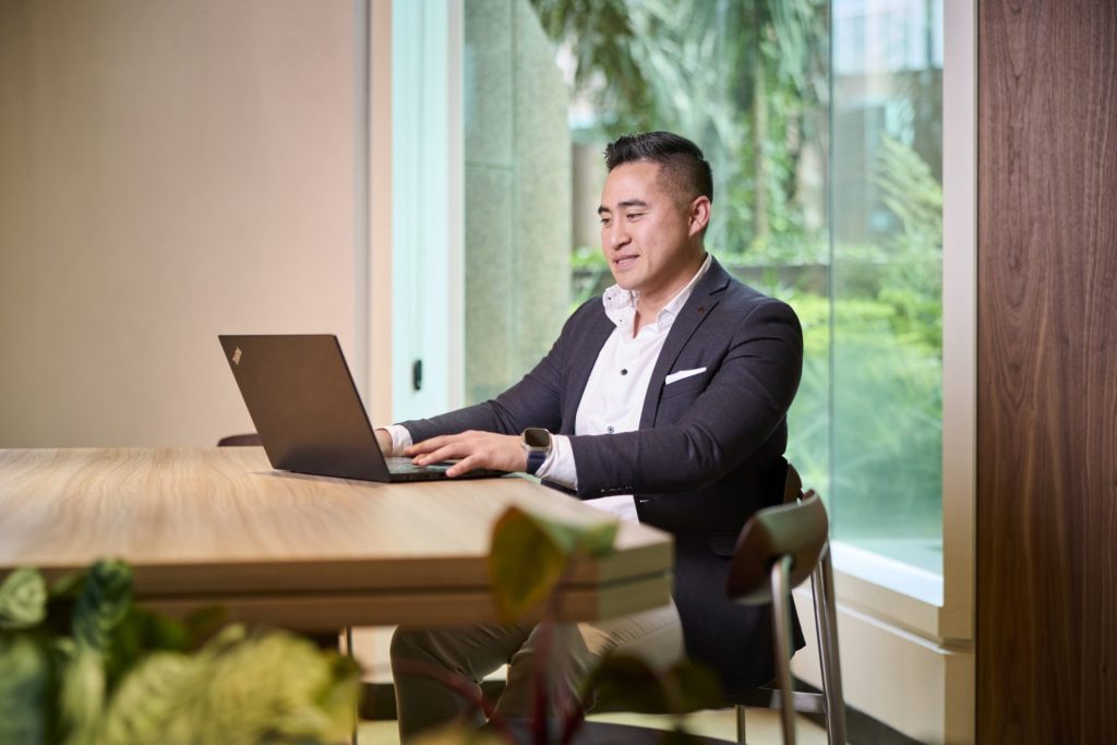 Man using laptop. ibm i Advent One